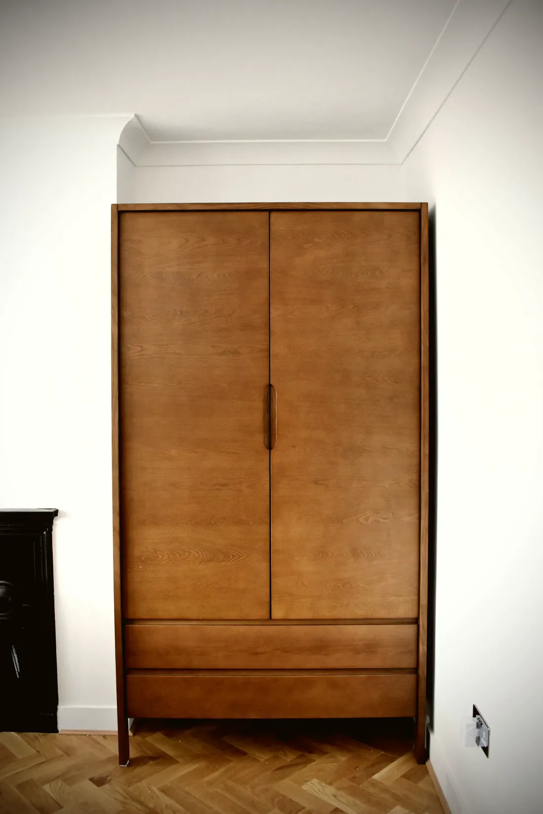 Made-to-measure timber wardrobe with panelled doors
