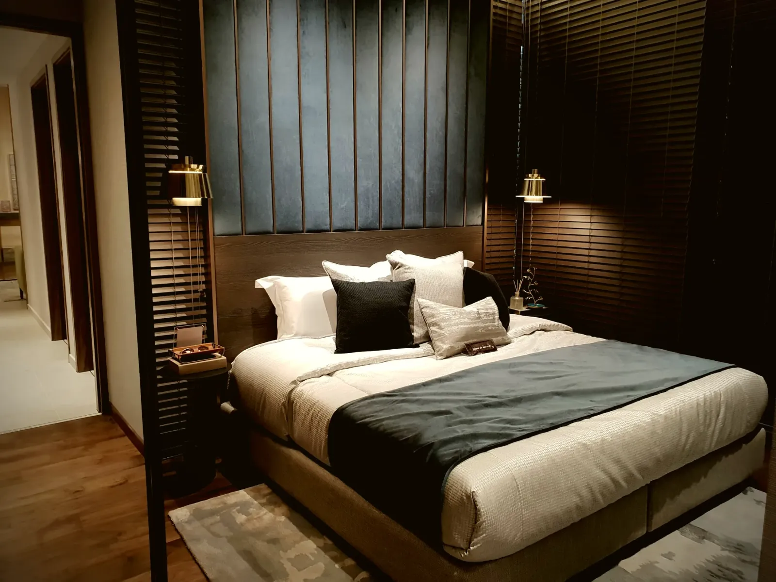 Bedroom with vertical timber panelling and fitted joinery