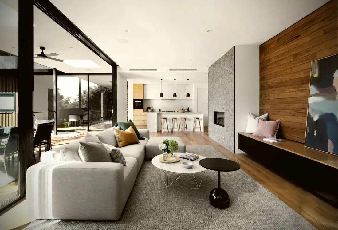 Living room with a timber feature wall and integrated media unit